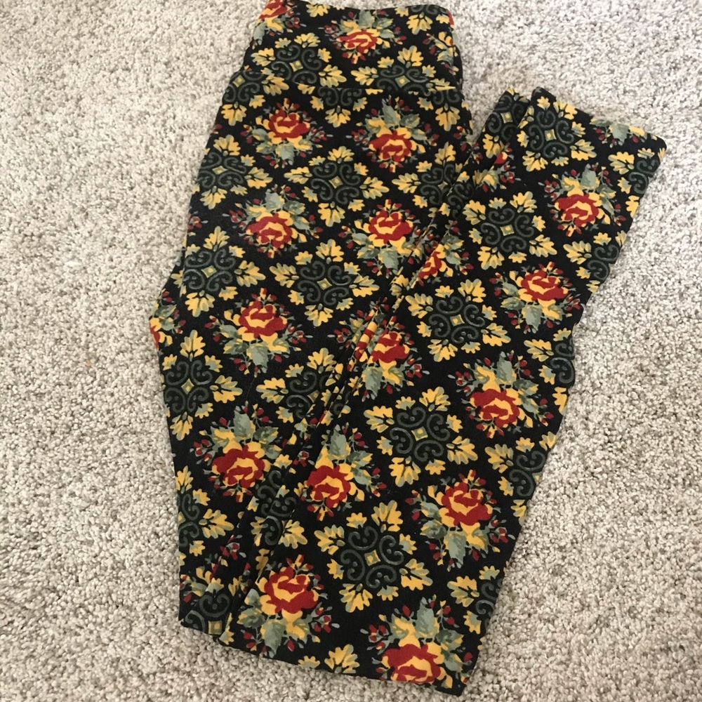 Black, red, and yellow Lularoe leggings